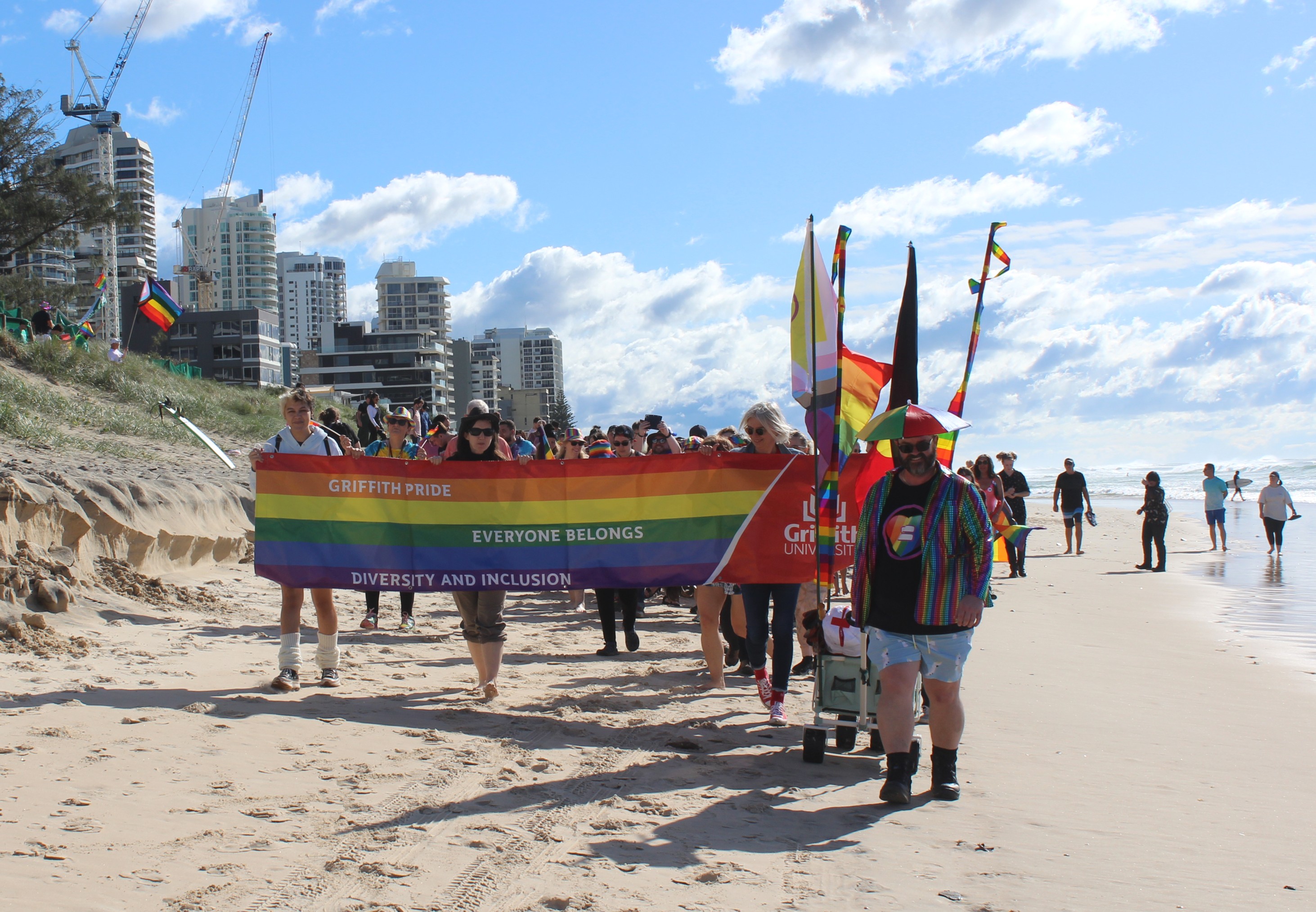 Beach Parade 2022 participants walking along Narrow Neck, Main Beach